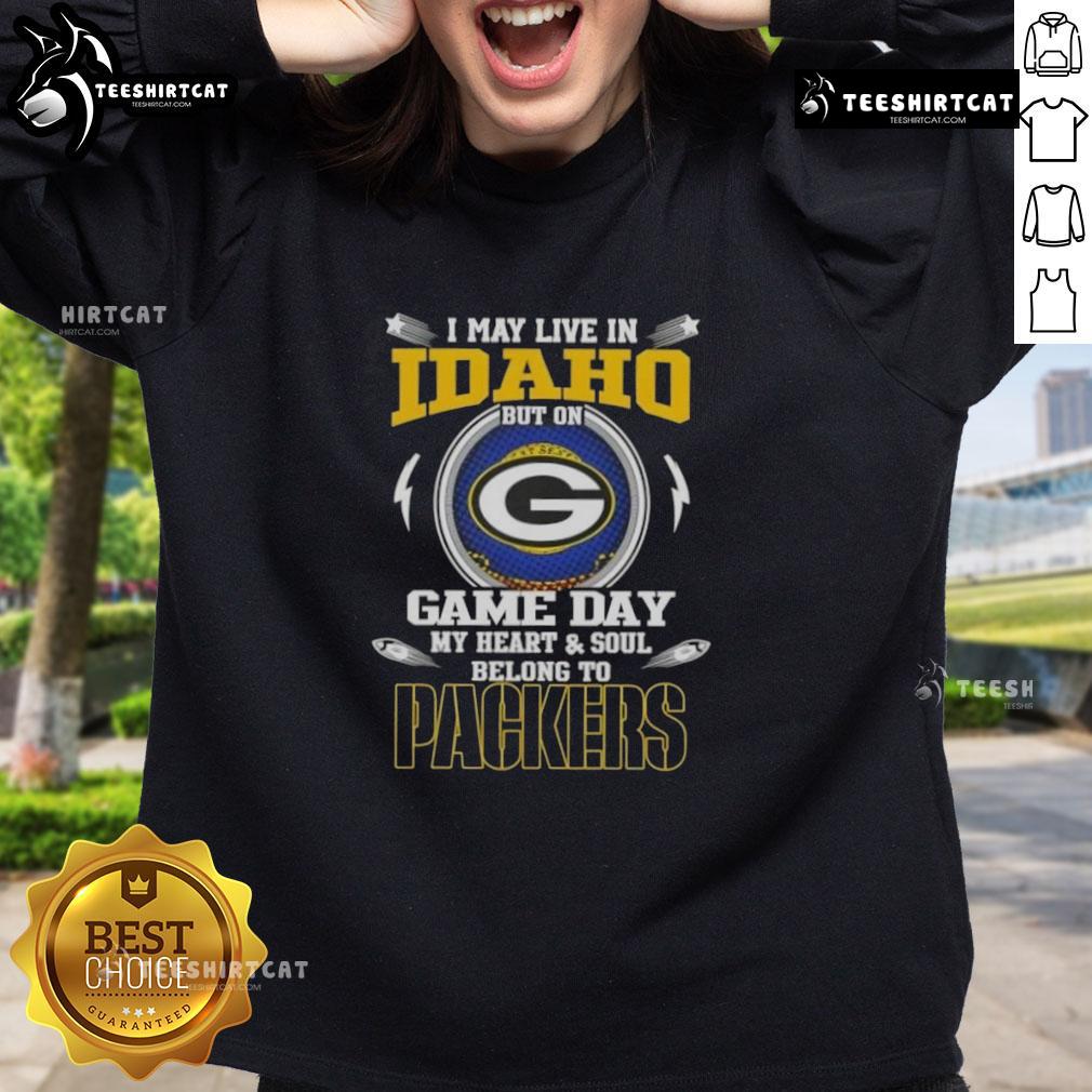 Green Bay Packers sweatshirt with 'Hot I May Live in Idaho But On Game Day My Heart and Soul Belongs to Green Bay' text.