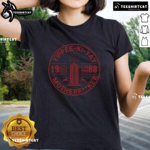 Womens 'Yippee Ki Yay' showdown tee featuring bold graphics, perfect for casual outfits and fans of iconic movie quotes.