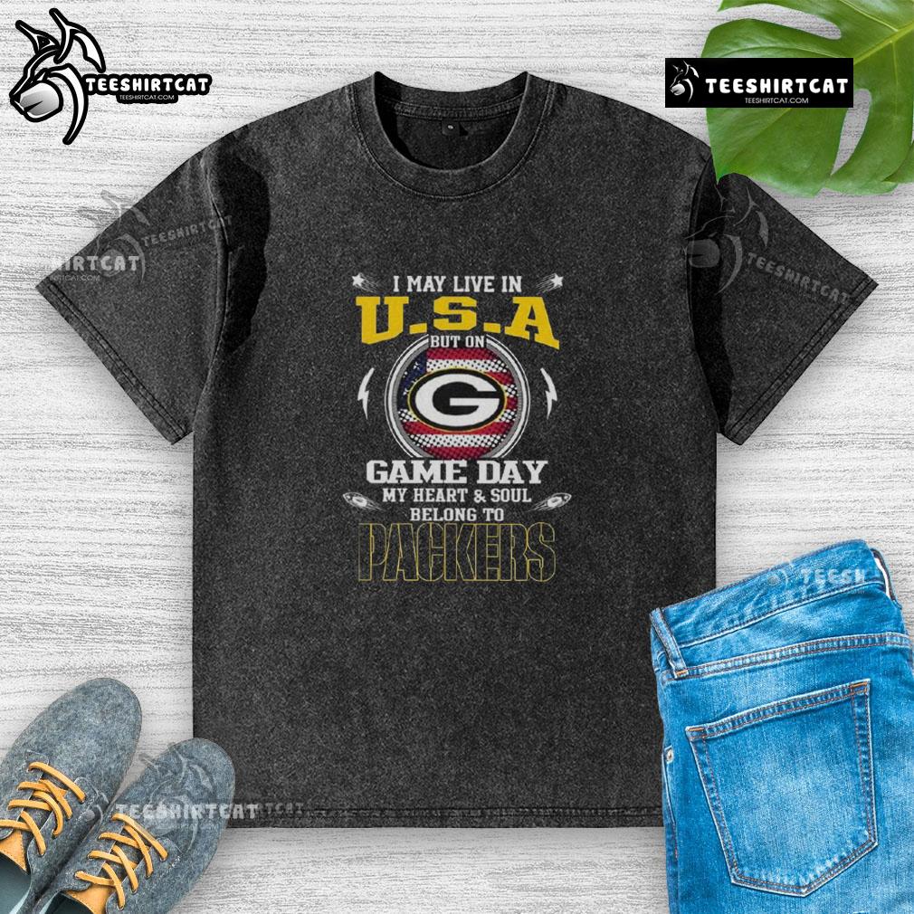 Green Bay Packers washed t-shirt with 'I May Live In U.S.A But On Game Day My Heart And Soul Belongs To Green Bay' design.