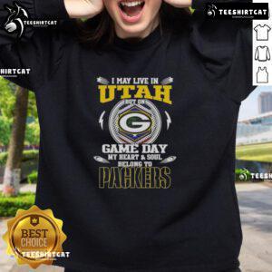 Alt Text: Green Bay Packers sweatshirt with I may live in Utah but on game day my heart and soul belongs to Green Bay design.