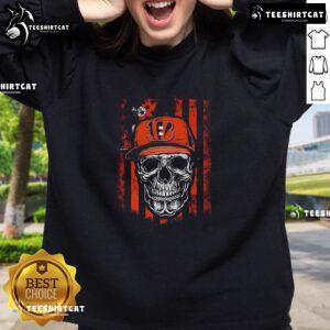 Alt Text: Premium Cincinnati Bengals NFL sweatshirt featuring a skull design and American flag for football lovers.