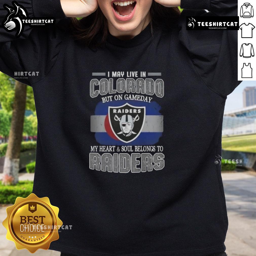 Alt Text: Premium sweatshirt featuring I May Live In Colorado, But On Gameday My Heart Belongs To Raiders design.