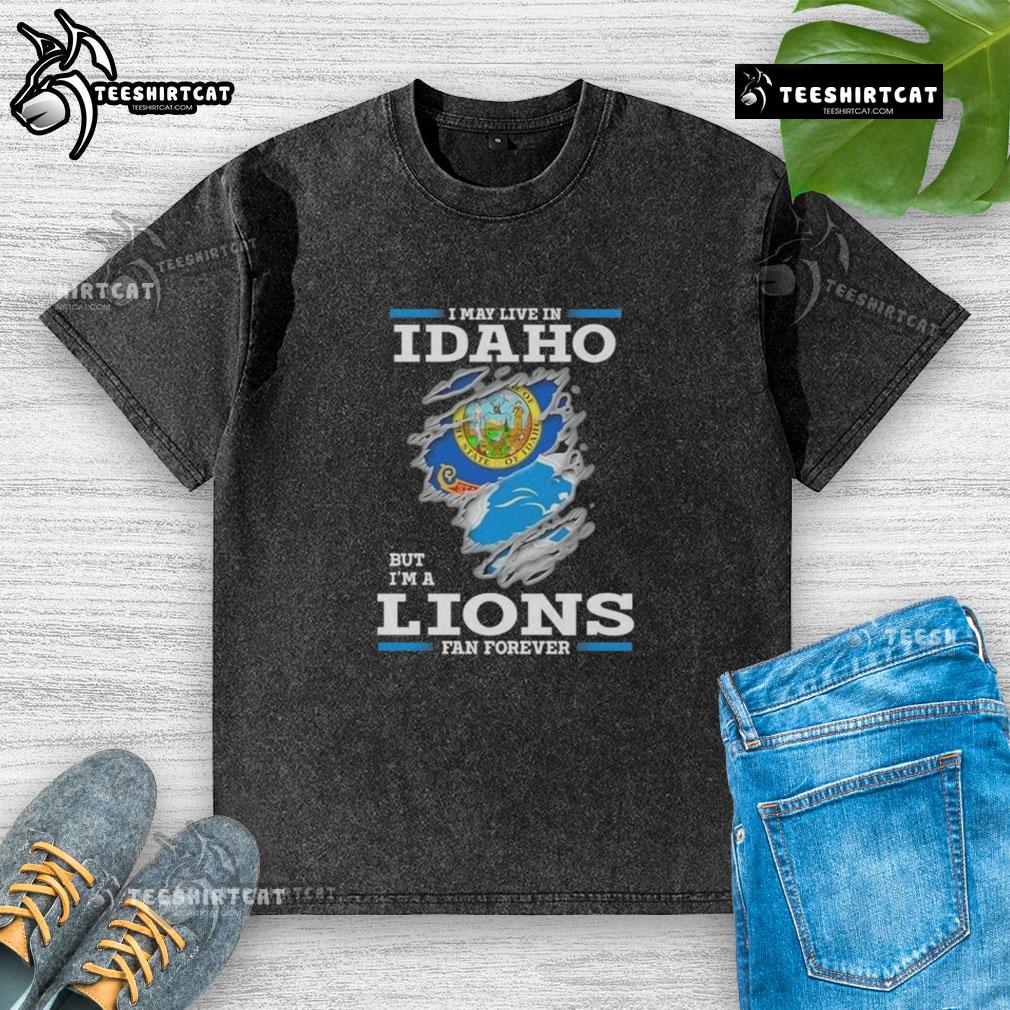 Premium washed t-shirt featuring 'I May Live In Idaho But I'm A Lions Fan Forever' design, perfect for loyal fans.