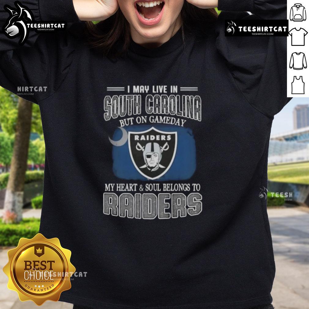 Alt Text: Premium sweatshirt featuring I May Live In South Carolina But On Gameday My Heart Belongs To Raiders design.