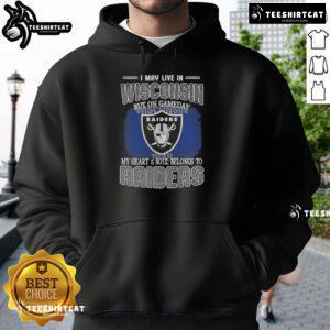 Premium hoodie with 'I May Live In Wisconsin But On Gameday My Heart And Soul Belongs To Raiders' design.