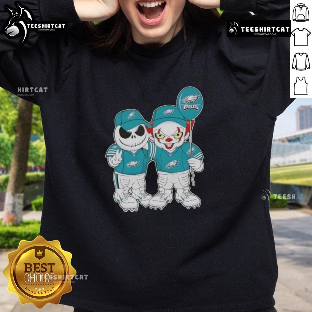 Premium Jack Skellington and Clown It sweatshirt for Philadelphia Eagles fans, perfect for a spooky Halloween celebration.