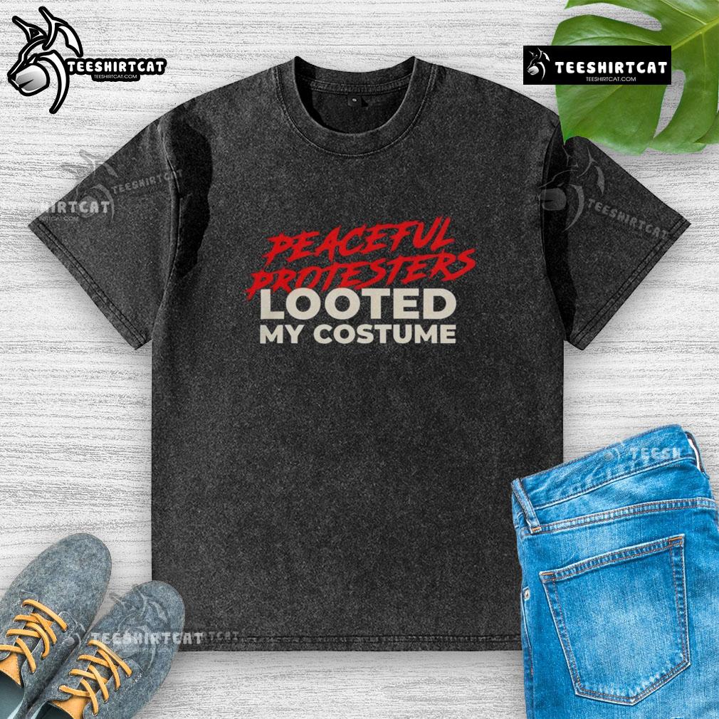 Alt Text: Premium peaceful protesters wearing looted costume washed T-shirts during a demonstration for social justice.