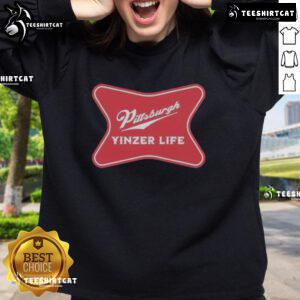 Premium Pittsburgh Yinzer Life sweatshirt featuring 'The Champagne of Cities' slogan in vibrant colors.