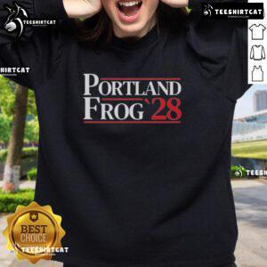 Premium Portland Frog 2028 Sweatshirt featuring a vibrant frog design, perfect for cozy casual wear and frog enthusiasts.