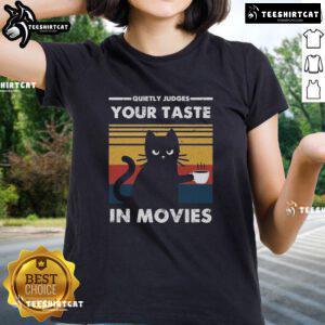 Premium Ladies Tee featuring 'Quietly Judges Your Taste in Movies' design, perfect for movie lovers and casual wear.
