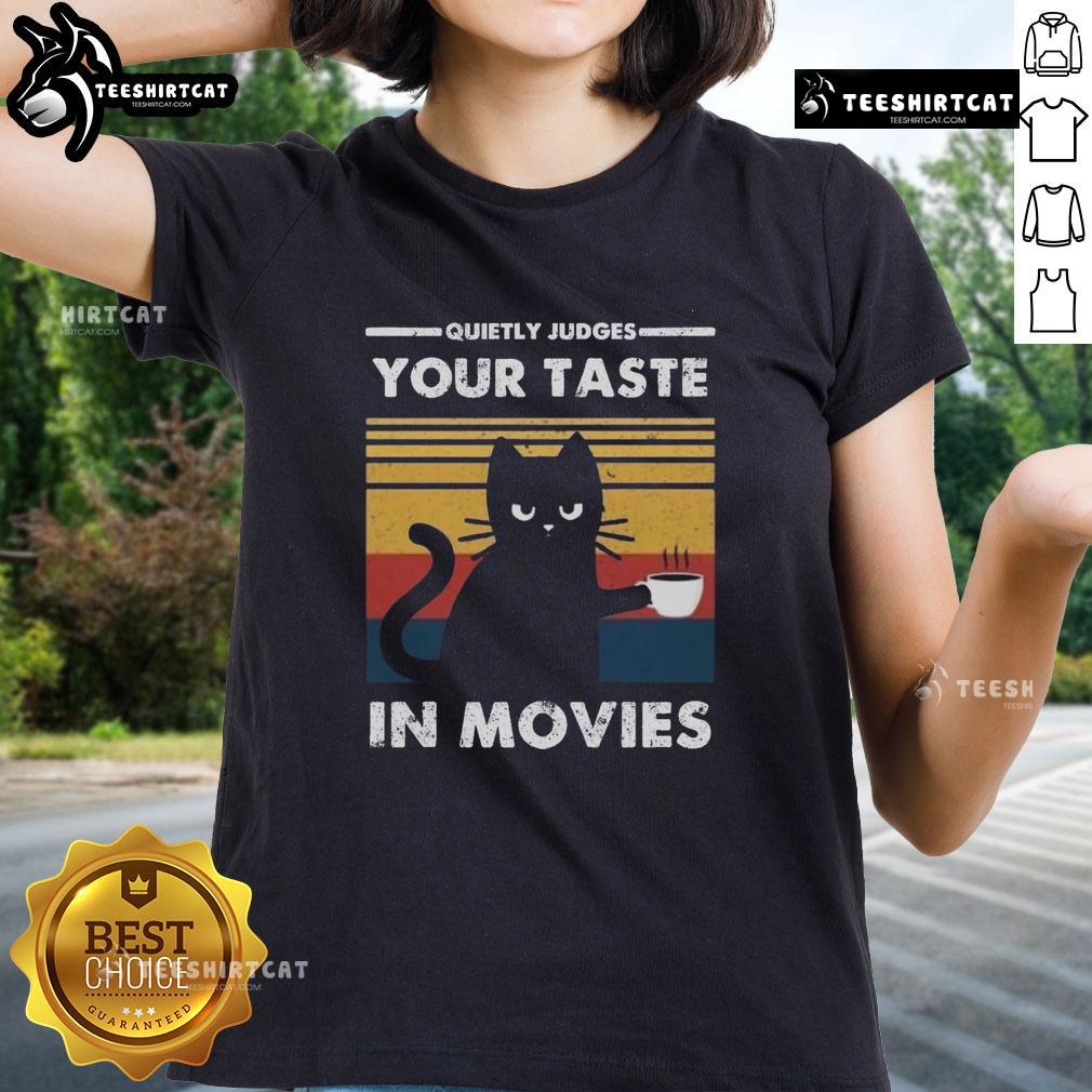 Premium Ladies Tee featuring 'Quietly Judges Your Taste in Movies' design, perfect for movie lovers and casual wear.