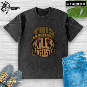 Alt Text: Premium 'This Machine Kills Fascists' washed t-shirt, featuring a bold graphic and a comfortable fit for casual wear.