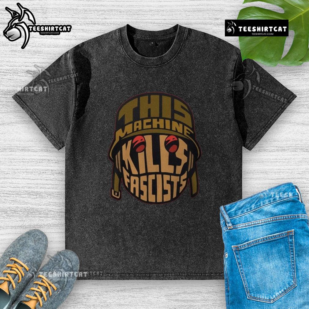 Alt Text: Premium 'This Machine Kills Fascists' washed t-shirt, featuring a bold graphic and a comfortable fit for casual wear.
