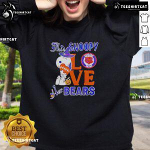 Alt Text: Premium Snoopy Love Her Chicago Bears sweatshirt featuring a cute Snoopy graphic in team colors for fans.