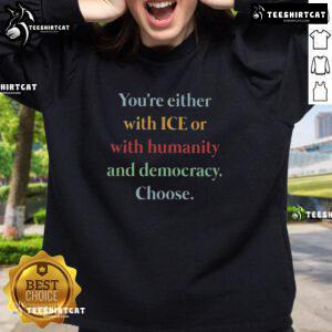 Alt Text: Premium sweatshirt featuring 'Youre Either With Ice or With Humanity and Democracy' slogan in bold design.