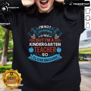 Cozy sweatshirt reading 'I'm Not Superwoman, But I'm A Kindergarten Teacher' perfect for educators and fans of teaching.