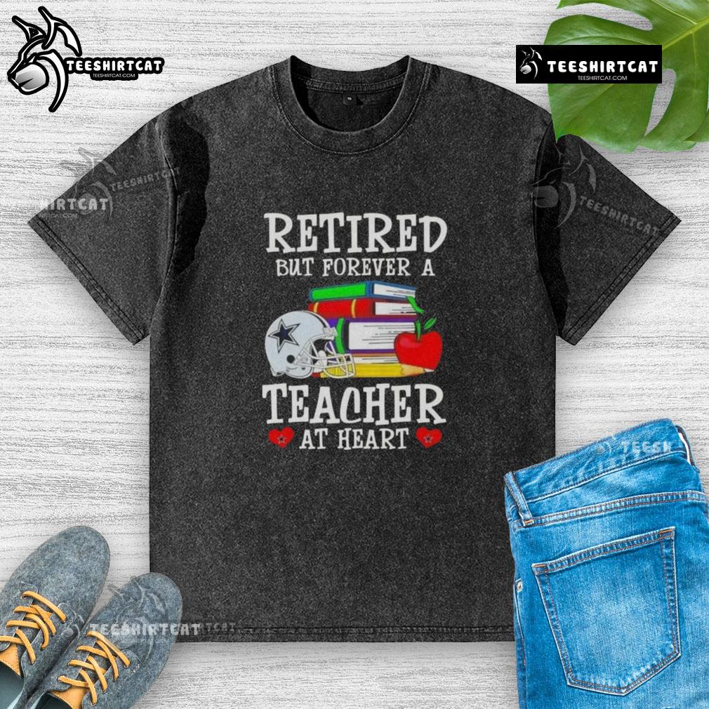 Pretty retired but forever a teacher at heart, Dallas Cowboys football washed t-shirt displayed on a hanger.