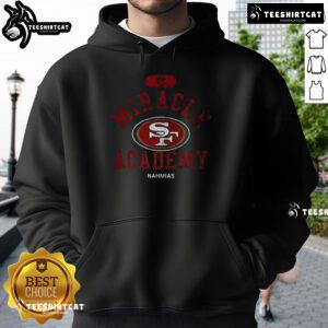 Pretty San Francisco 49ers NFL Miracle Academy Nahmias hoodie worn by a fan at a game, showcasing team spirit and style.