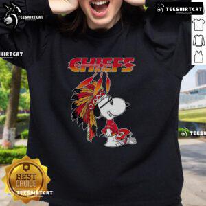 Pretty Snoopy War Bonnets Kansas City Chiefs sweatshirt featuring a unique football helmet design.