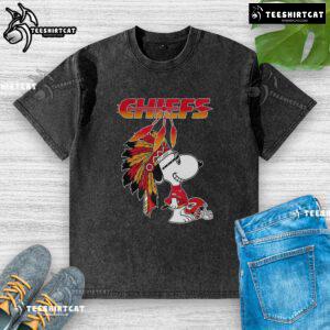 Pretty Snoopy War Bonnets Kansas City Chiefs football helmet on a washed t-shirt, showcasing playful sports apparel design.