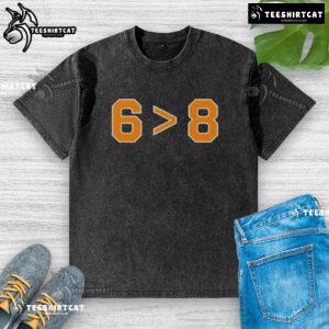 Top 6-8 Tennessee Volunteers Football washed t-shirt in orange, featuring team logo and vintage style for fans.