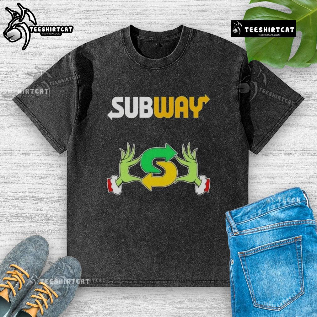 Top Grinch hands holding a subway sandwich on a Merry Christmas washed t-shirt, perfect for festive holiday style.