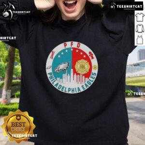 Philadelphia Eagles football skyline sweatshirt featuring team colors and logo, perfect for fans and stylish game day wear.