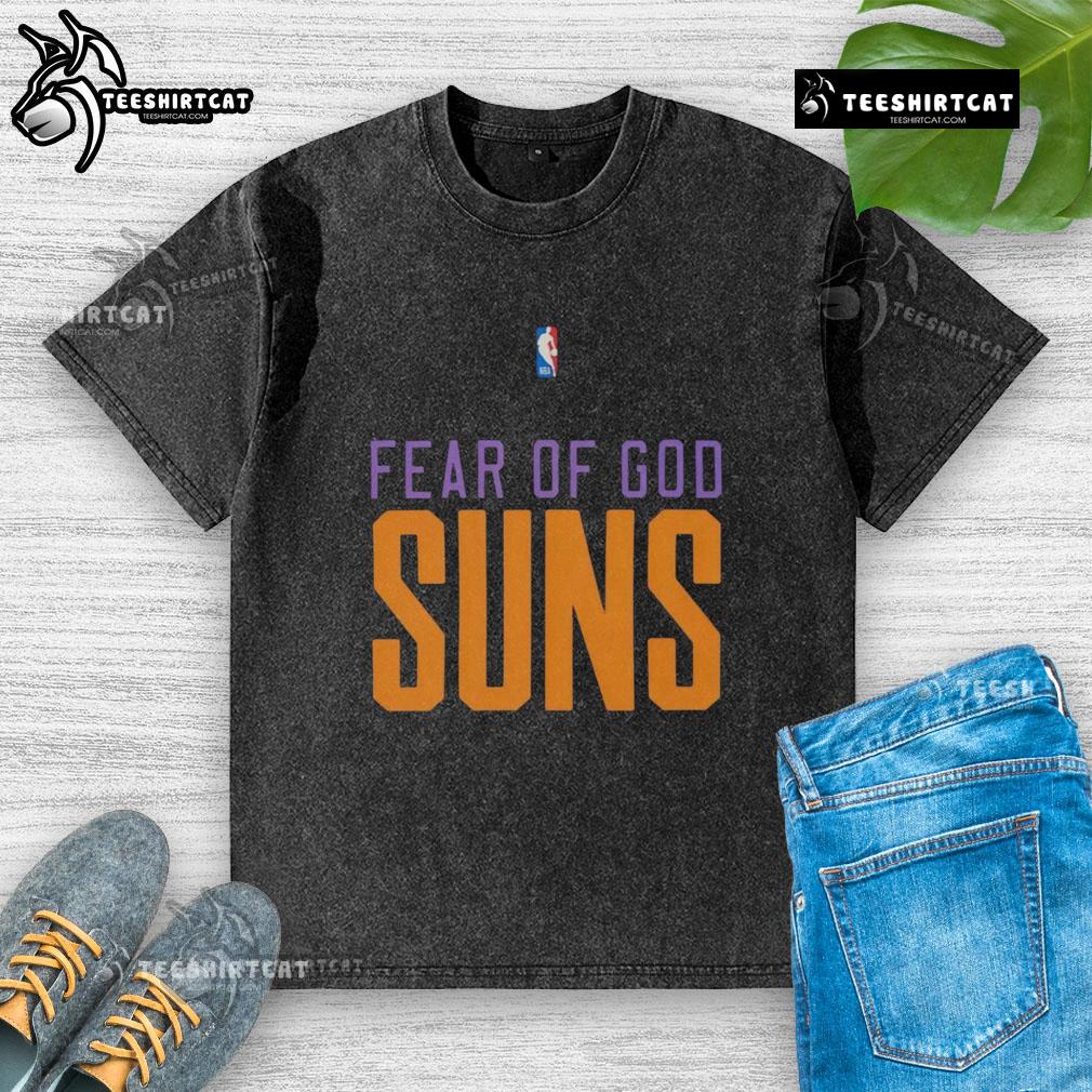 Alt Text: Top Phoenix Suns NBA Fear of God Washed T-Shirt featuring bold logo and stylish design for fans.