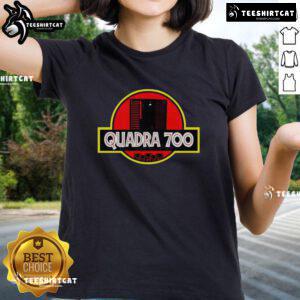 Top Quadra 700 X Jurassic Park Ladies Tee featuring a vibrant dinosaur graphic and comfortable fit for fans.