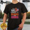 Girl wearing a Chicago Bears and Cubs T-shirt, showcasing her love for Chicago sports in a vibrant urban setting.
