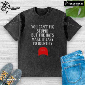 Alt Text: MAGA red hat washed t-shirt with humorous text 'You Can't Fix Stupid' designed for casual wear and political statement.