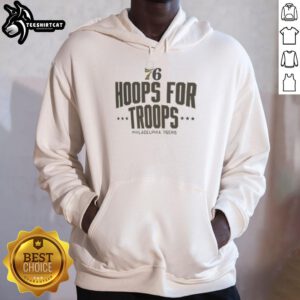 Alt Text: Stylish 'Nice Hoops For Troops' Philadelphia 76ers basketball hoodie featuring team colors and logo, perfect for fans.