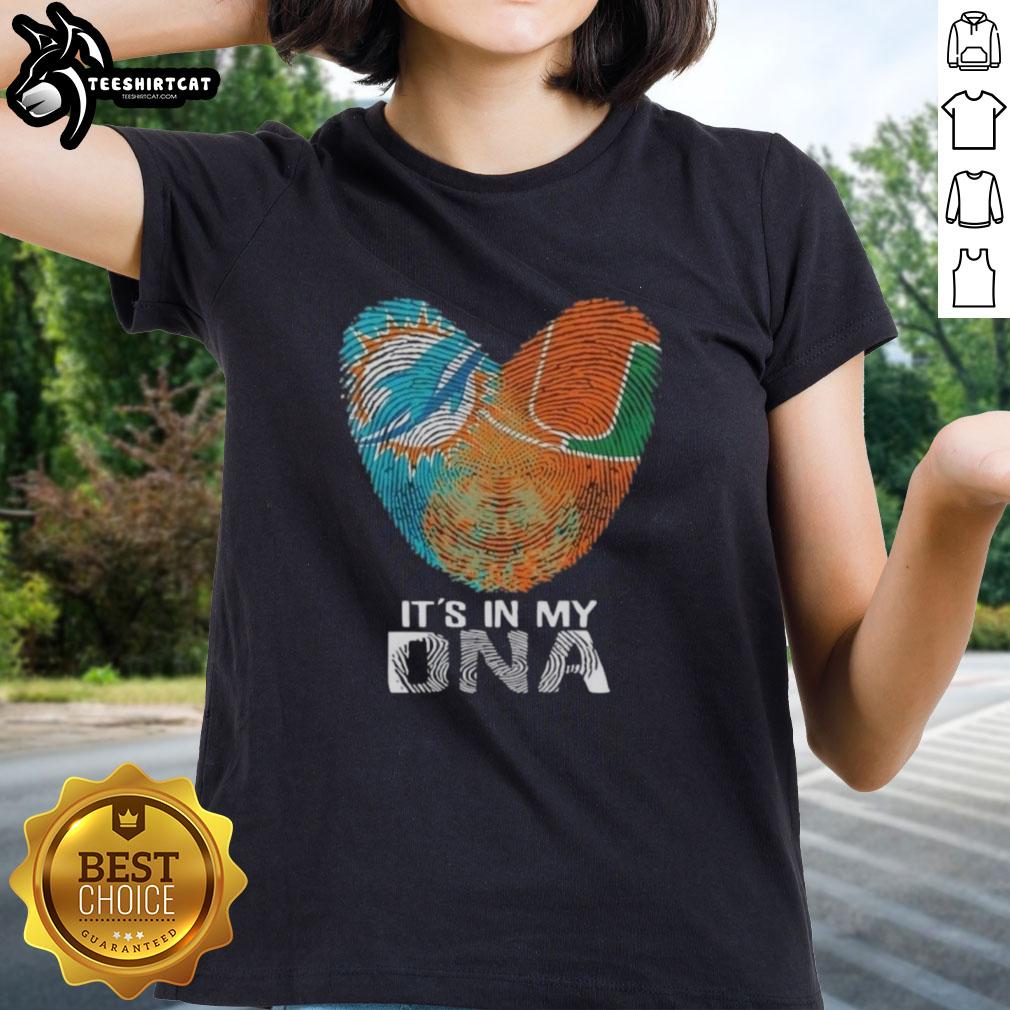 Official Miami City Sports Dolphins X Hurricanes ladies tee featuring 'It's In My DNA' design with heart and fingerprint.