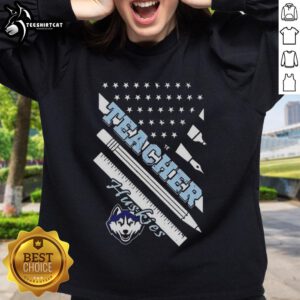 Alt Text: Original Connecticut Huskies X Teacher American Flag Sweatshirt featuring vibrant colors and a stylish design.