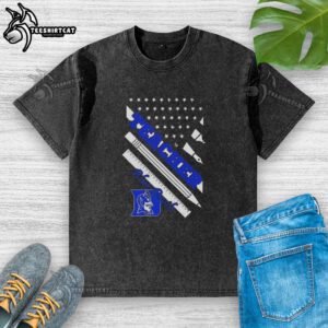 Alt Text: Original Duke Blue Devils X Teacher American Flag Washed T-Shirt featuring a patriotic design and Duke logo.