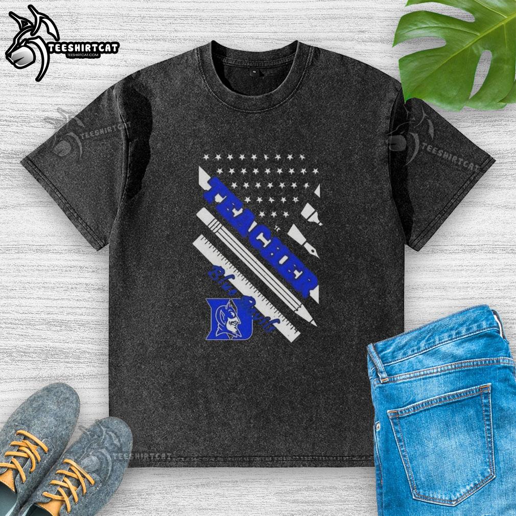 Alt Text: Original Duke Blue Devils X Teacher American Flag Washed T-Shirt featuring a patriotic design and Duke logo.