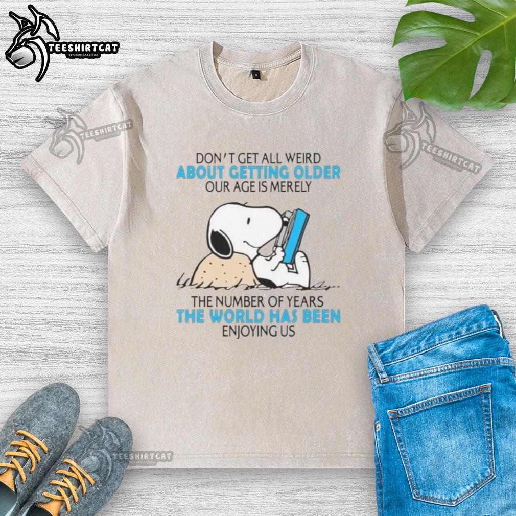 Washed t-shirt with 'Good, dont get all weird about getting older' text, promoting a positive outlook on aging.