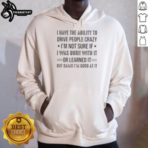 Happy person wearing 'I Have The Ability To Drive People Crazy' hoodie, showcasing humor and personality in casual style.