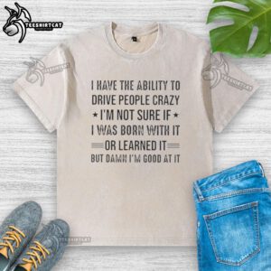 Happy person wearing a 'I Can Drive People Crazy' washed t-shirt, showcasing a playful, humorous style.