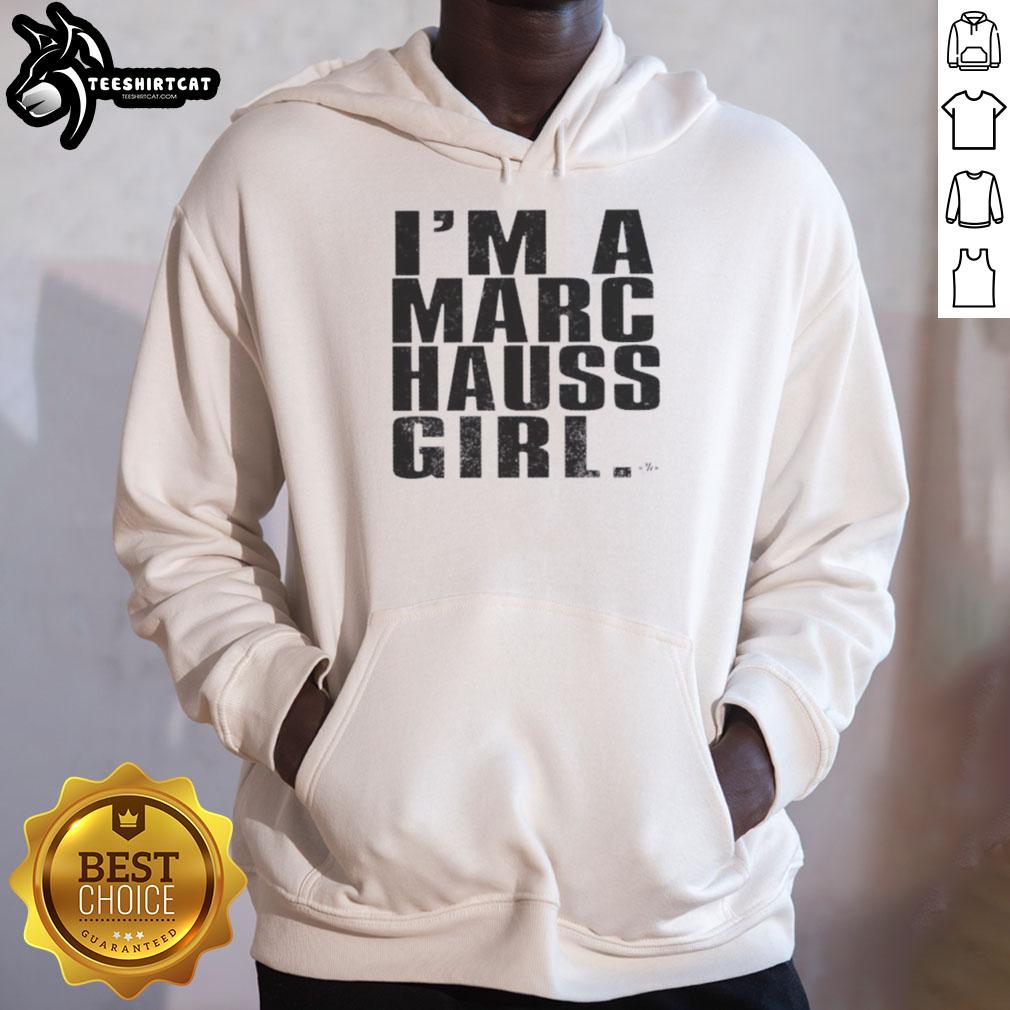 Happy girl wearing a Marc Hauss hoodie, showcasing trendy style and comfort in vibrant colors.
