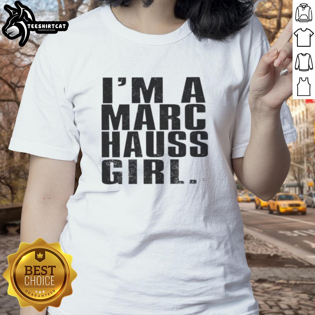 Happy woman wearing a Marc Hauss ladies tee, showcasing vibrant design and stylish comfort for casual outfits.