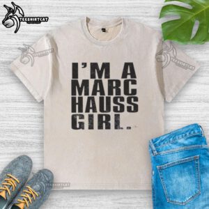 Happy model wearing a washed T-shirt from Marc Hauss, showcasing a trendy casual style and vibrant colors.