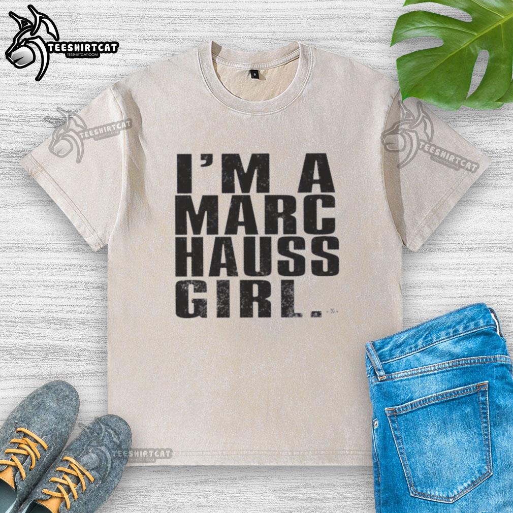 Happy model wearing a washed T-shirt from Marc Hauss, showcasing a trendy casual style and vibrant colors.