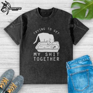 Nice Trying To Get My Shit Together washed t-shirt displayed on a rustic wooden background, showcasing its casual style.