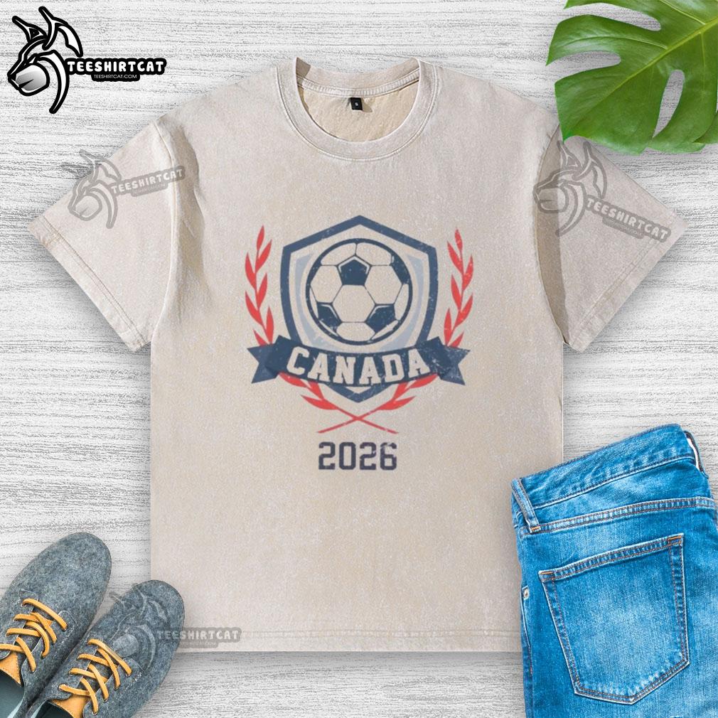 Official Canada 2026 Vintage Soccer Crest Washed T-Shirt featuring a classic design and vibrant colors for soccer fans.