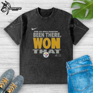 Alt Text: Official Pittsburgh Steelers 2025 AFC North Champions washed t-shirt featuring team logo and championship design.