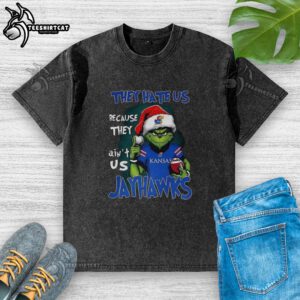 Official Santa Grinch 'They Hate Us Because They Ain't Us' Kansas Jayhawks washed t-shirt featuring colorful graphic design.