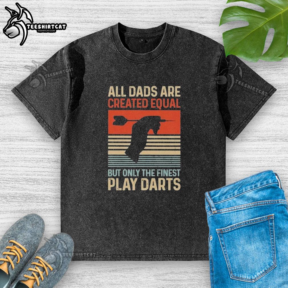 Alt Text: Vintage washed t-shirt with All Dads Are Created Equal But Only The Finest Play Darts graphic design.