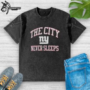 Alt Text: Original New York Giants Nike The City Never Sleeps washed t-shirt featuring bold team graphics and a comfortable fit.