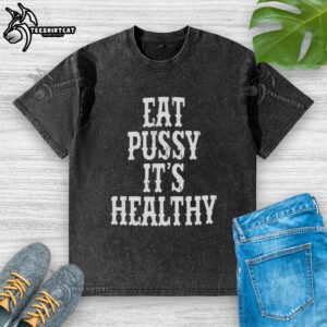 Alt Text: Original Rockstar Eat Pussy It's Healthy washed t-shirt featuring bold graphic print on a stylish design.